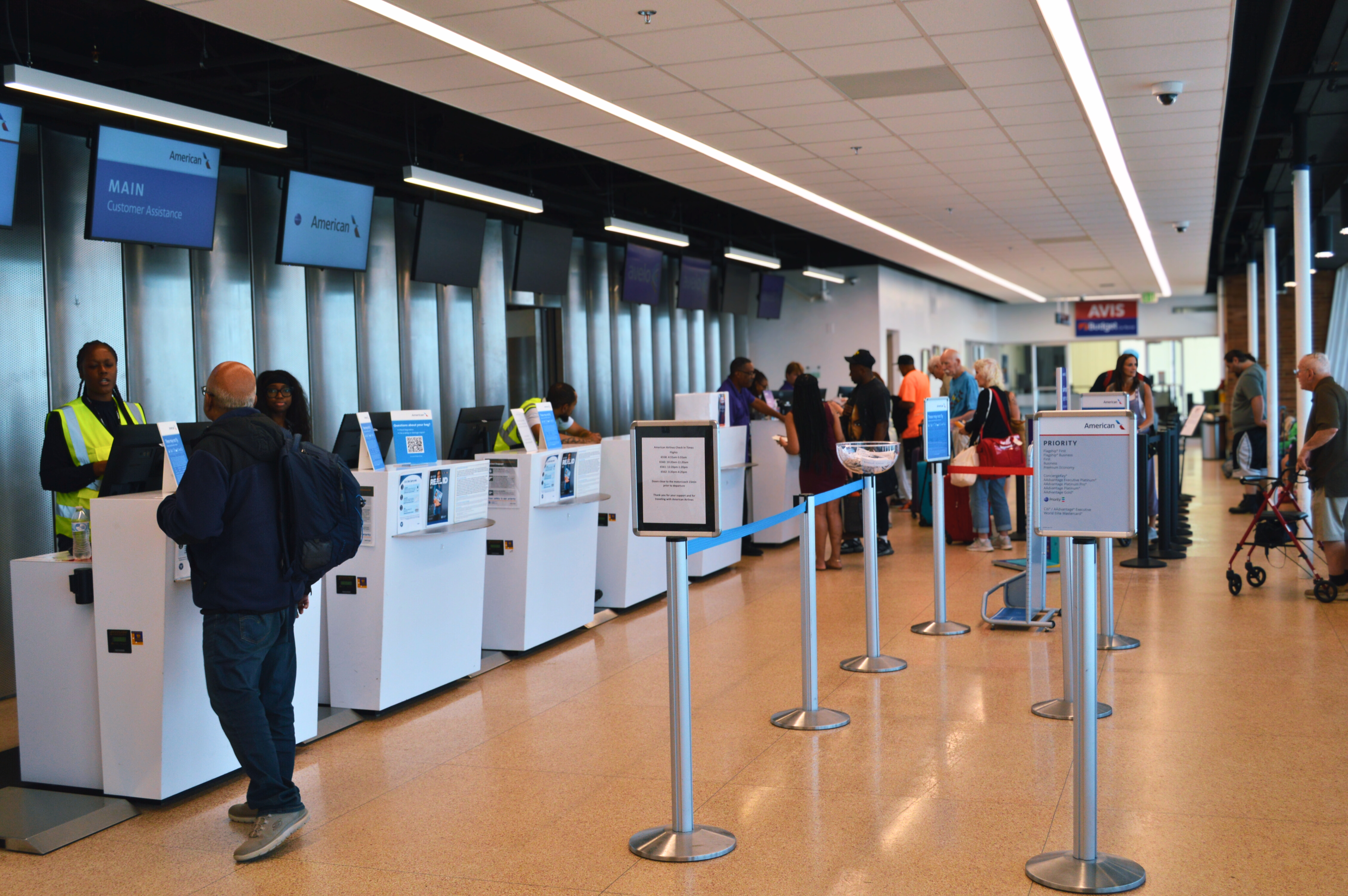 Passengers at the check-in counter at Wilmington Airport ILG