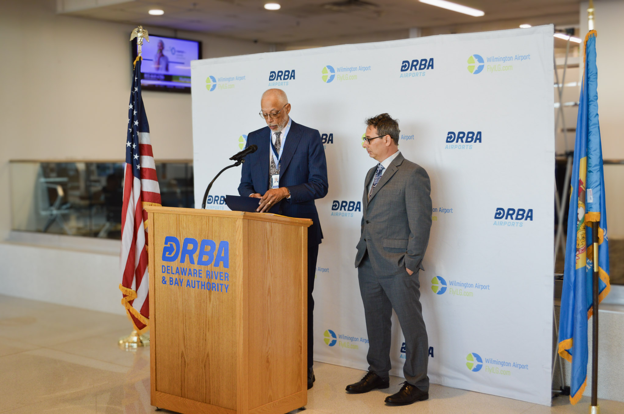 Mr. Bellanca stands at the Podium with Joel Coppadge, Executive Director of the Delaware River and Bay Authority, operator of Wilmington Airport ILG