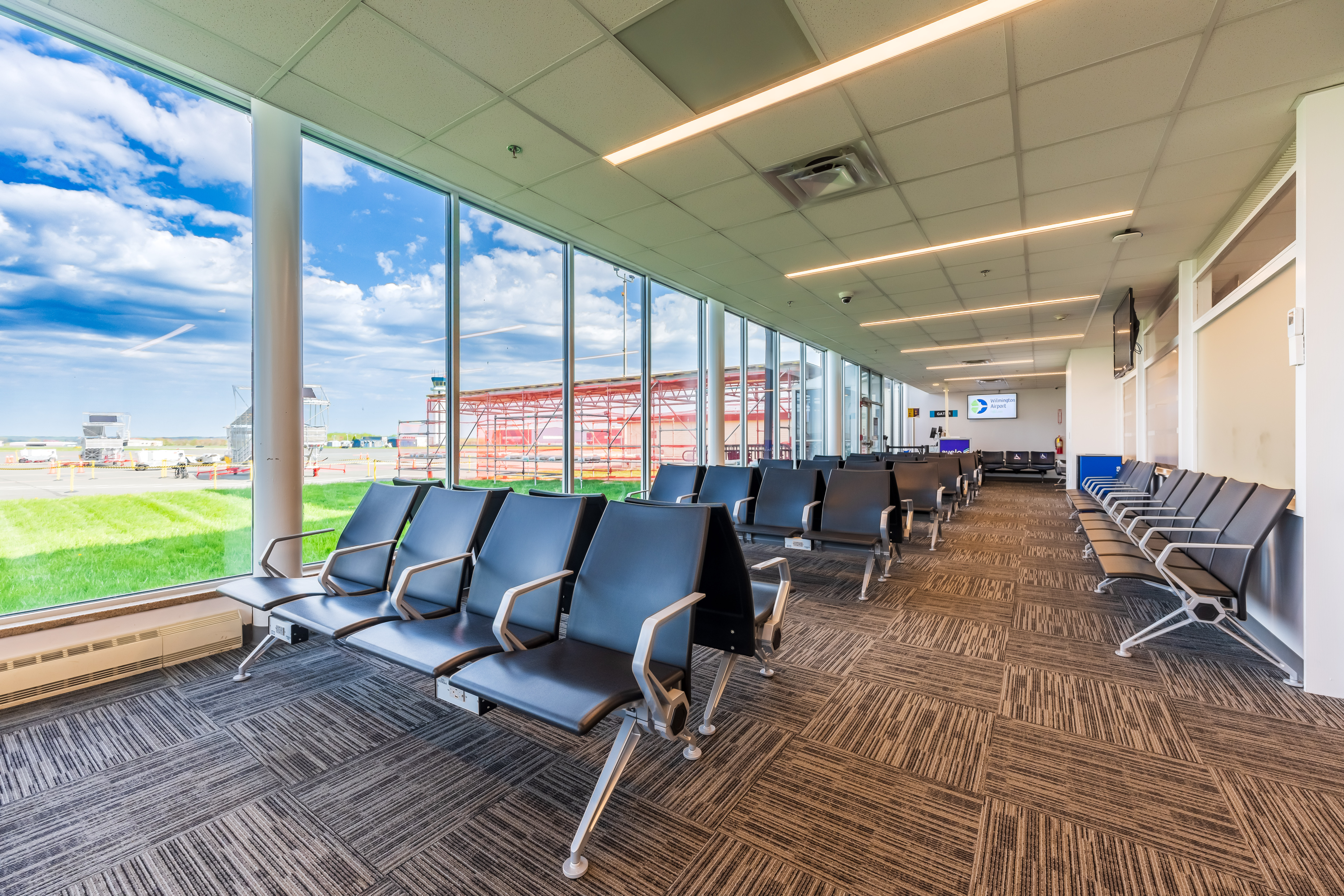ILG's single, easy-to navigate terminal with comfortable, spacious seating for travelers awaiting their flights.