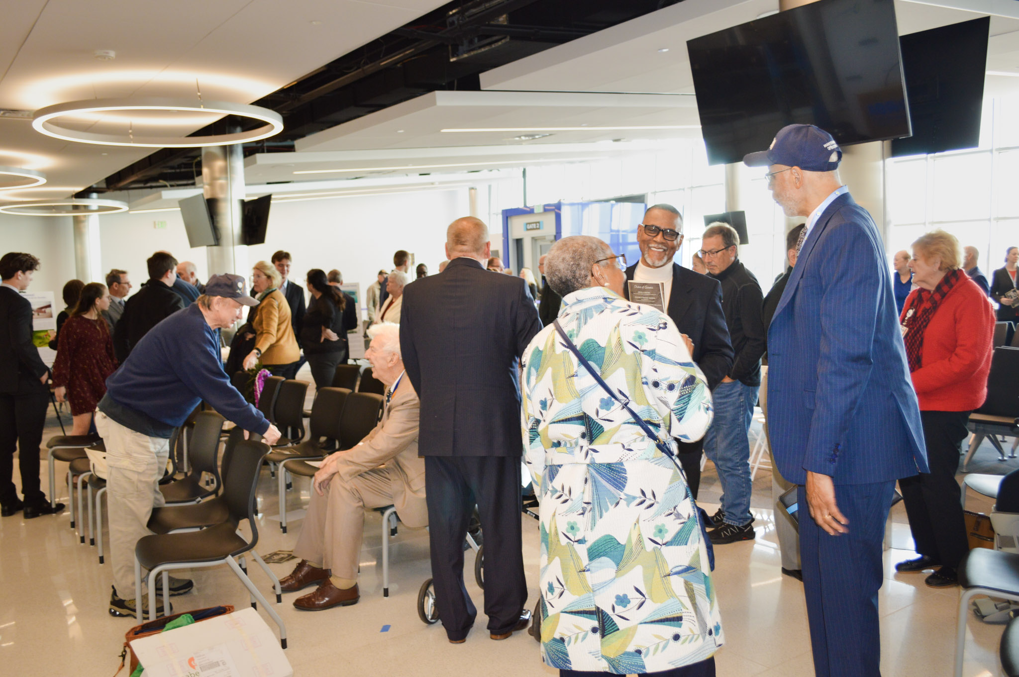The crowd gathered in the new gate area at Wilmington Airport ILG to honor the legacy of Giuseppe Bellanca on March 19, 2026