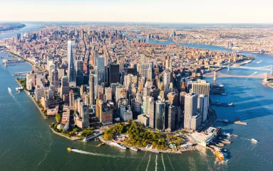 Arial view of NYC including skyscrapers and the Hudson River in Manhattan